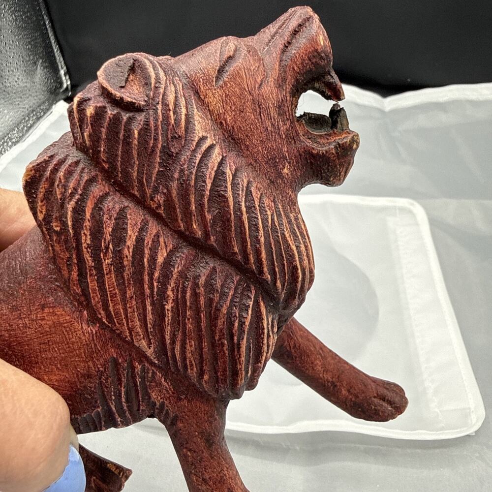 vintage hand-carved wooden lion figurine,